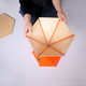 Illustration for article titled Magnetic Origami Tables Shouldn’t Make Sense But They’re Perfect